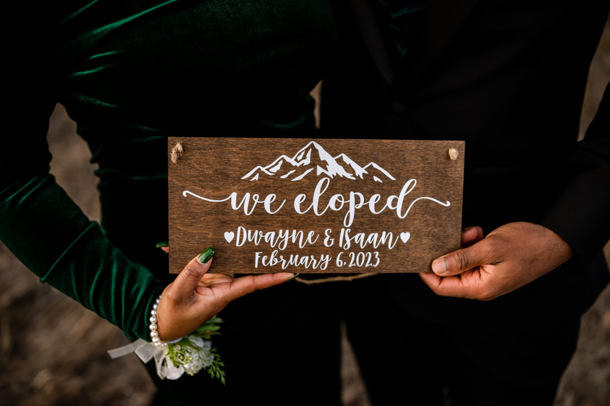 We 'eloped' sign - held by the bride and groom at their Chautauqua Trail elopement.