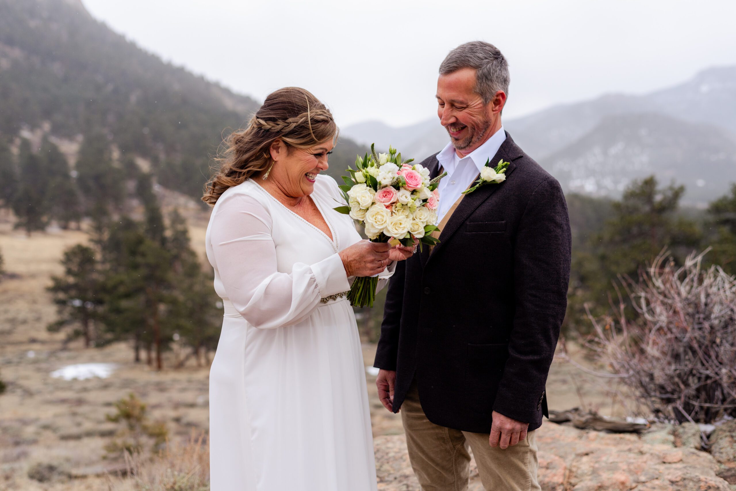 the bride smiles with excitement and joy during their spring elopement at 3M Curve.