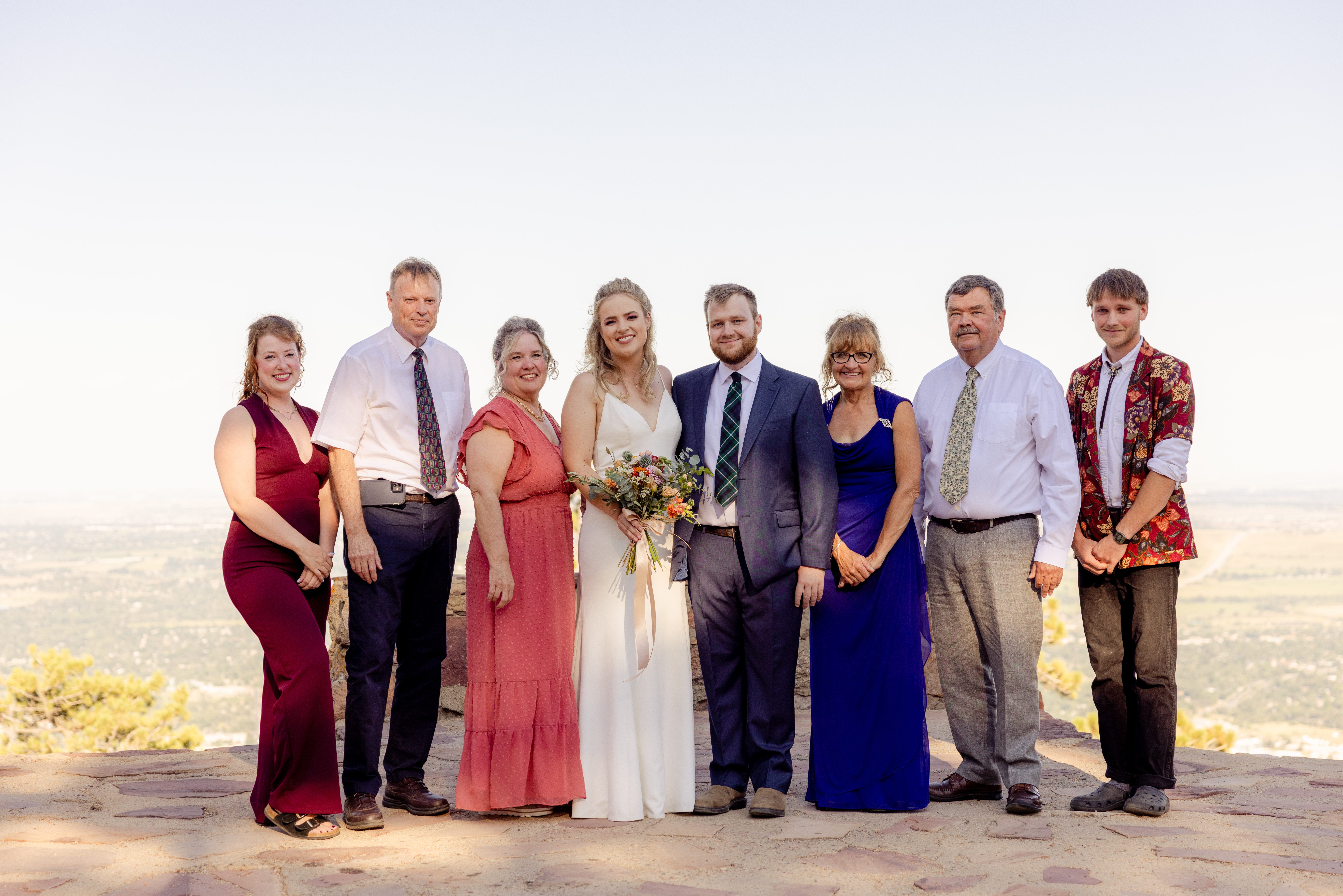 A group shot with the bride and groom's families after their Sunrise Amphitheater wedding.