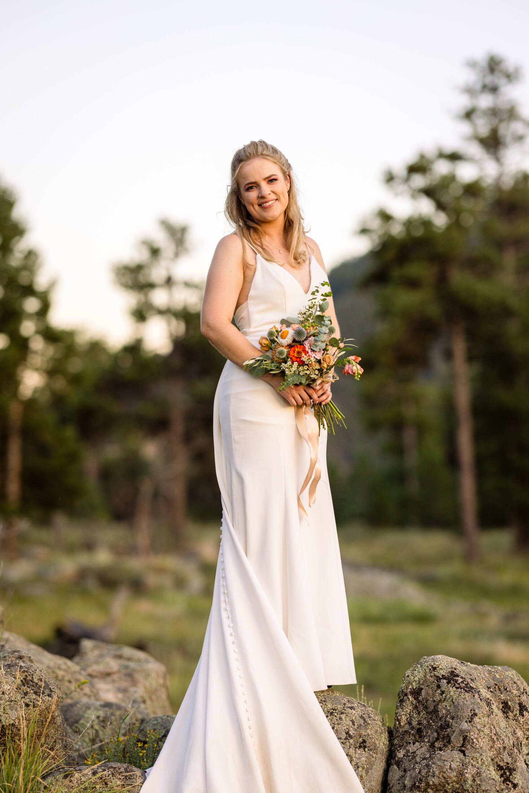 The beautiful bride in a gorgeous white gown after her Sunrise Amphitheater wedding.