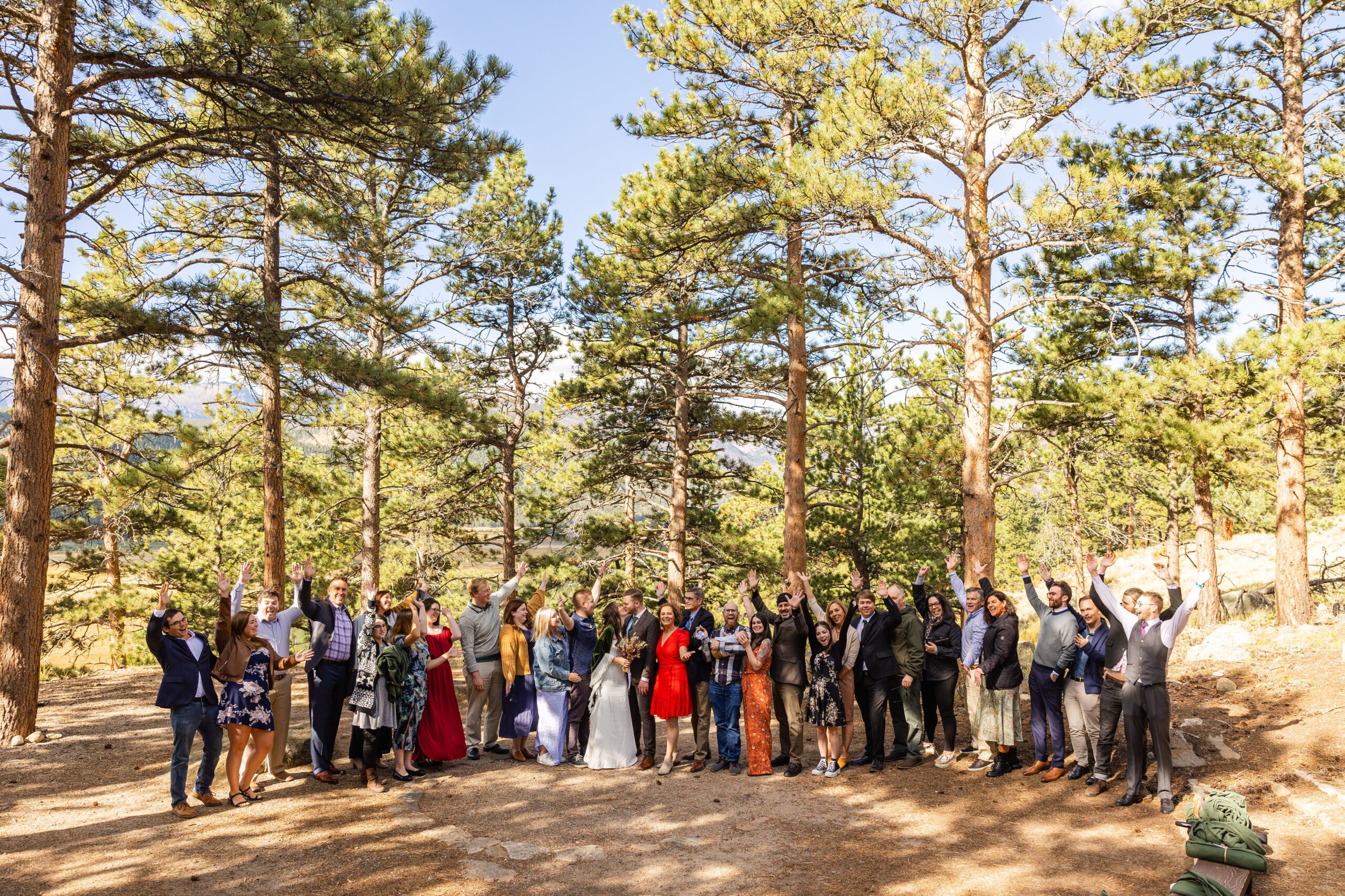 bride and groom and their guests, group photo at their Dream Lake elopement.