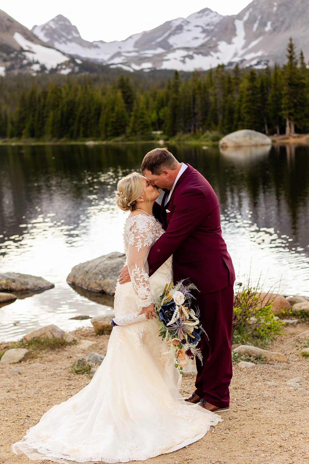 bride and groom nose-to-nose at Brainard Lake.