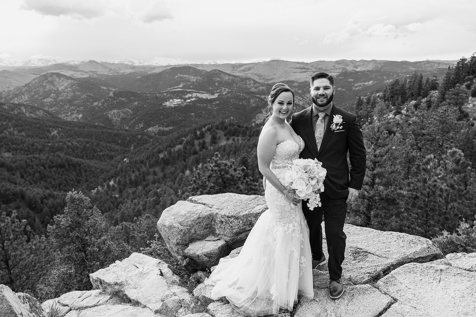 a black and white photo of the bride and groom after their ceremony at their Boulder elopement with videography.