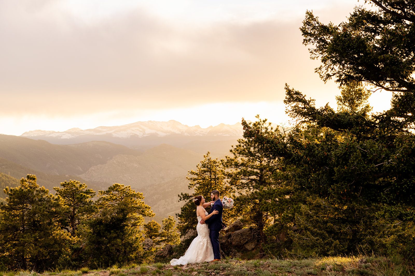 the bride and groom at sunset during their Boulder elopement with videography.