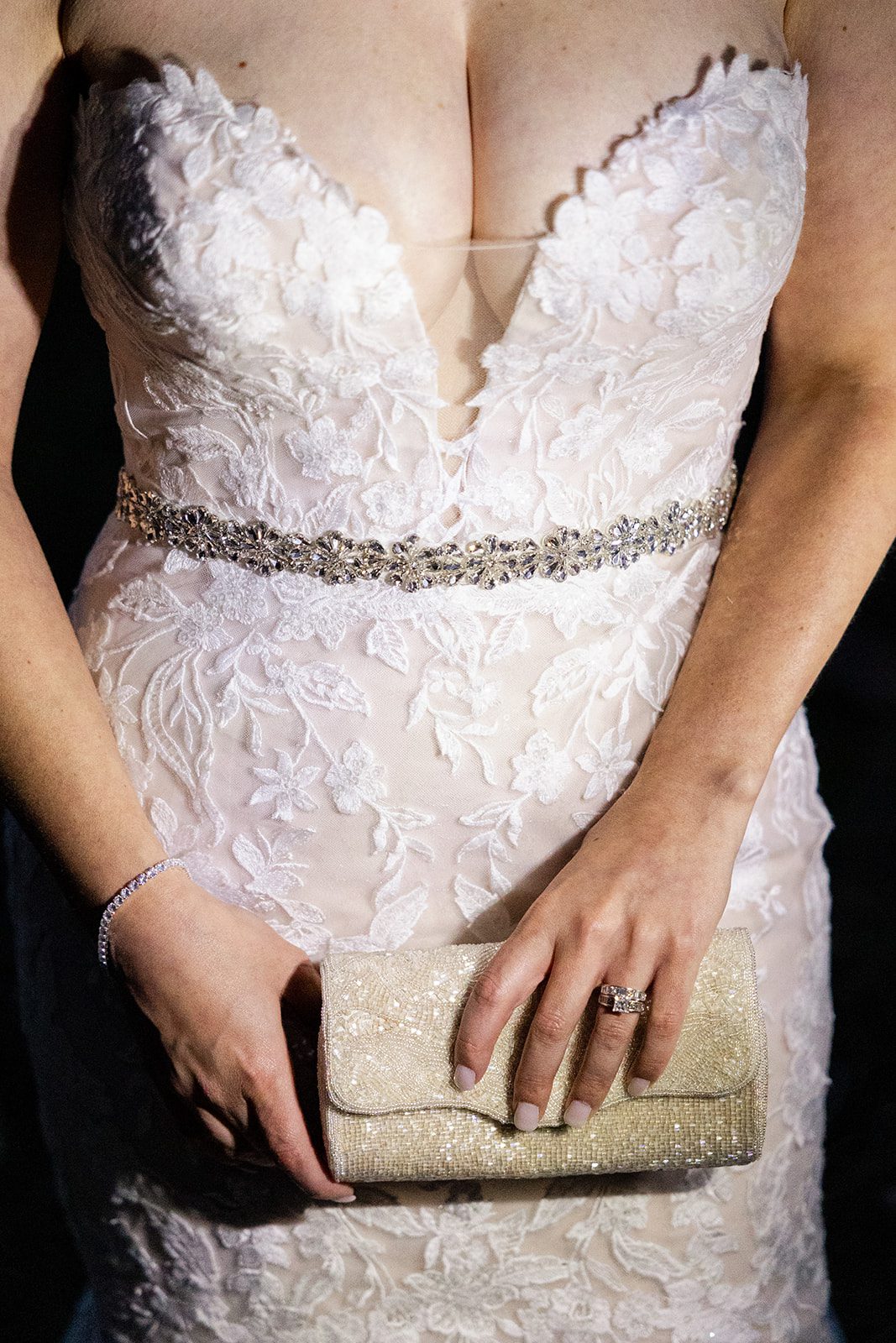 close-up shot of the bride's gown at their Boulder elopement with videography.