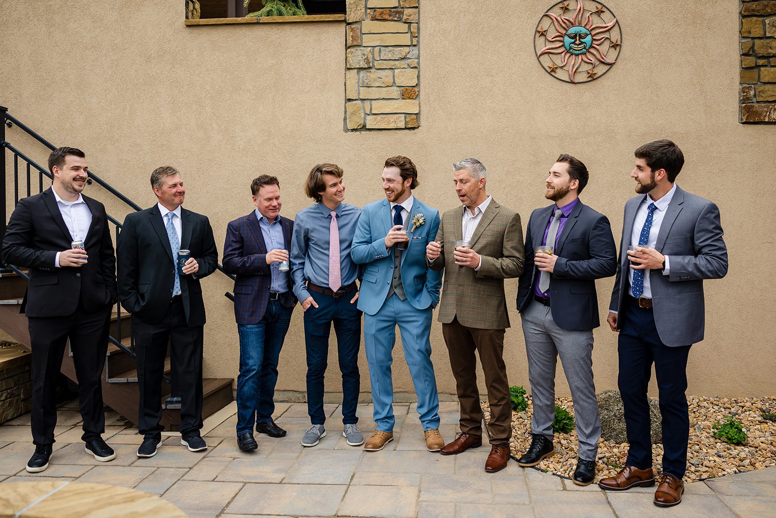 The groom in a blue suit and all of his groomsman before his Hidden Valley Elopement. 