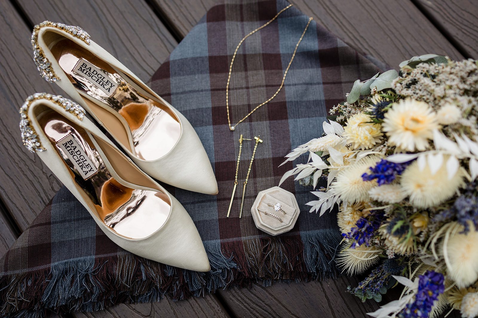 A details shot of the brides shoes and jewels at her Hidden Valley elopement ceremony. 