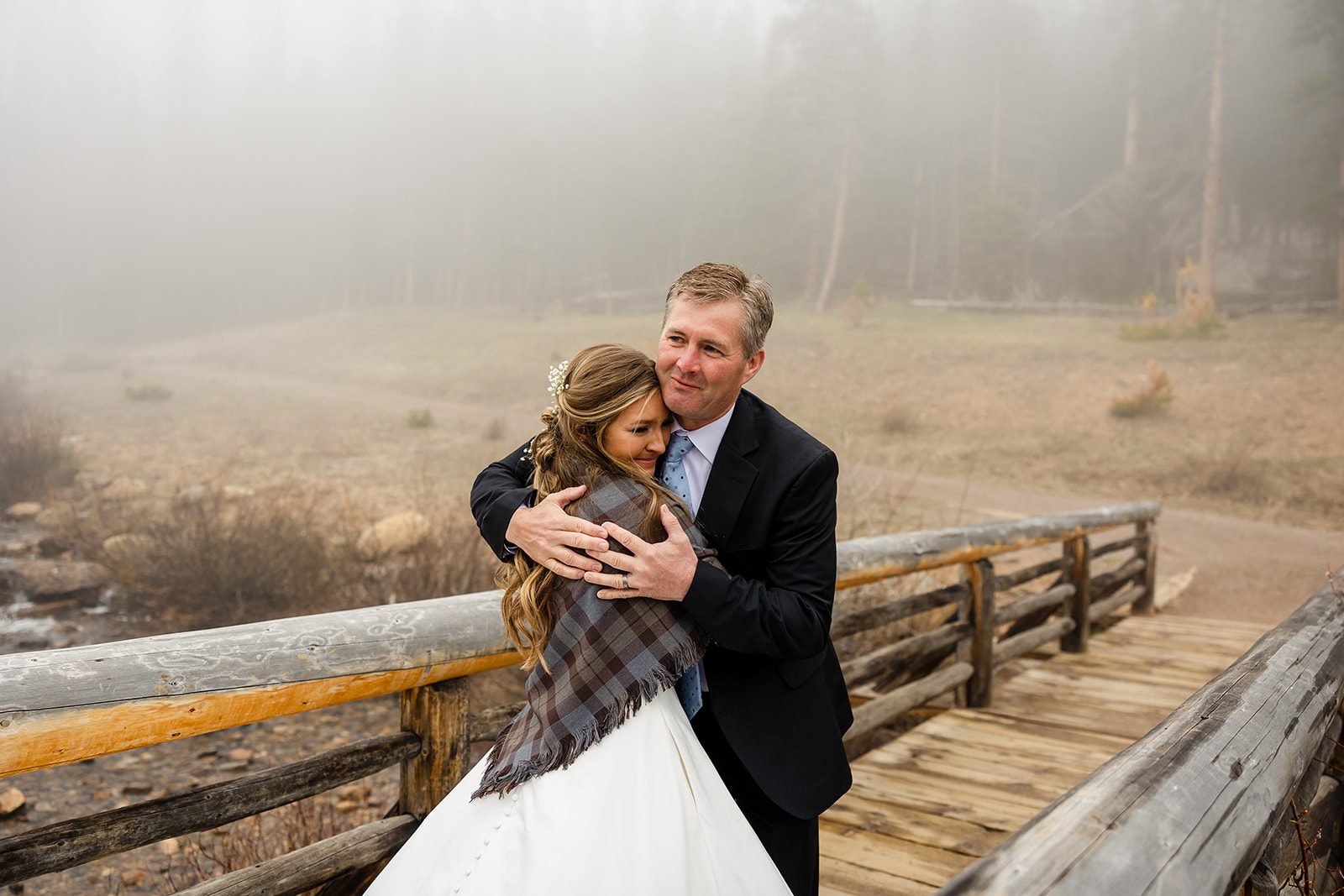 Bride and father first look at Hidden Valley in Rocky Mountain National park 