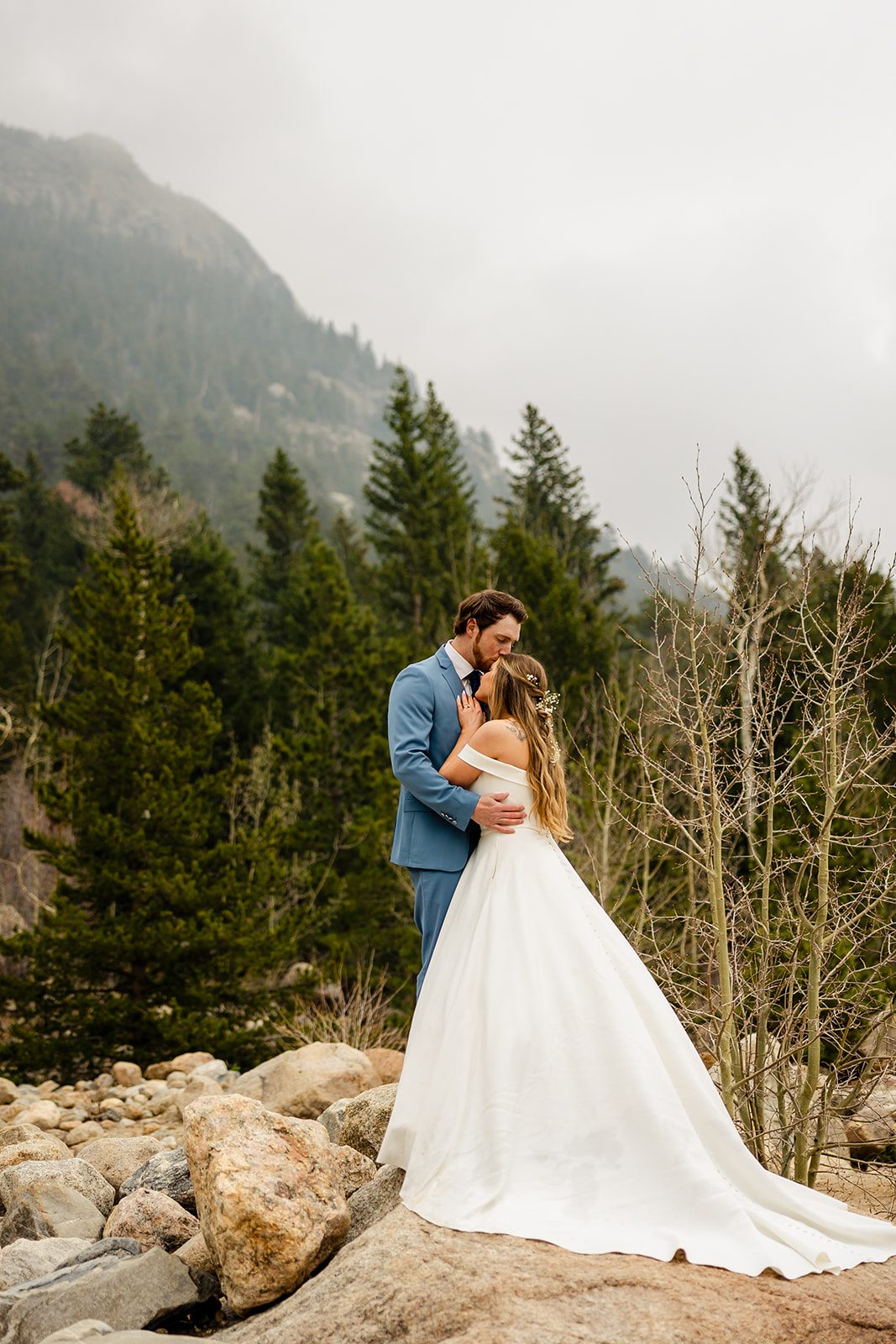 Bride and Groom Colorado Elopement photos at at Alluvial Fan Bridge in Rocky Mountain National Park