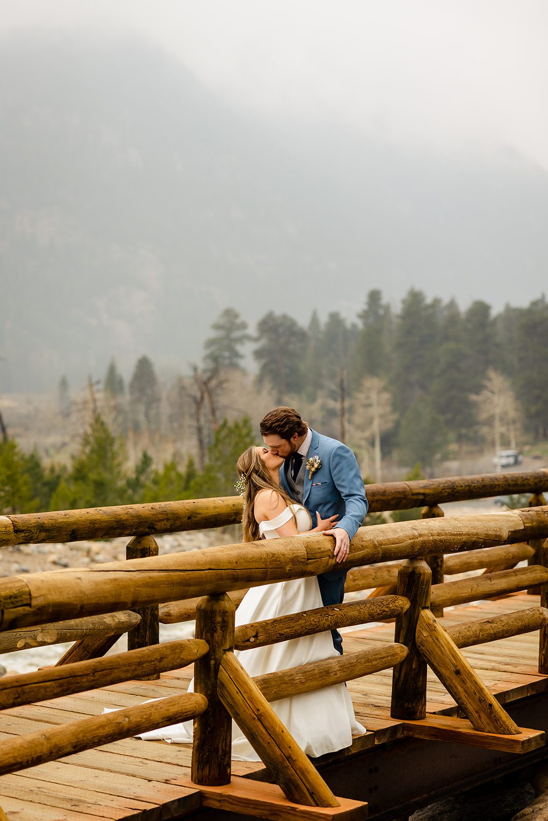 Bride and Groom Colorado Elopement photos at at Alluvial Fan Bridge in Rocky Mountain National Park