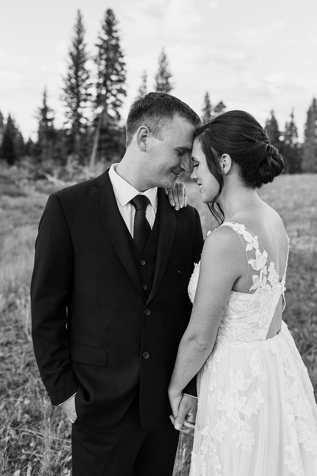 black and white photo of bride and groom at Sprague Lake