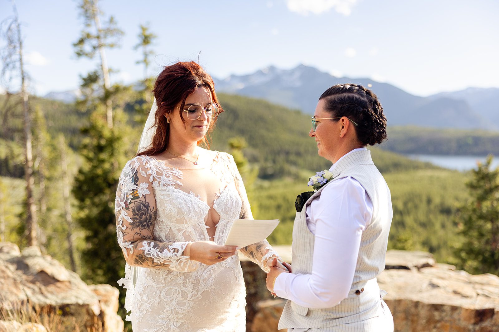 Bride reading vows during their  Summit County Elopement