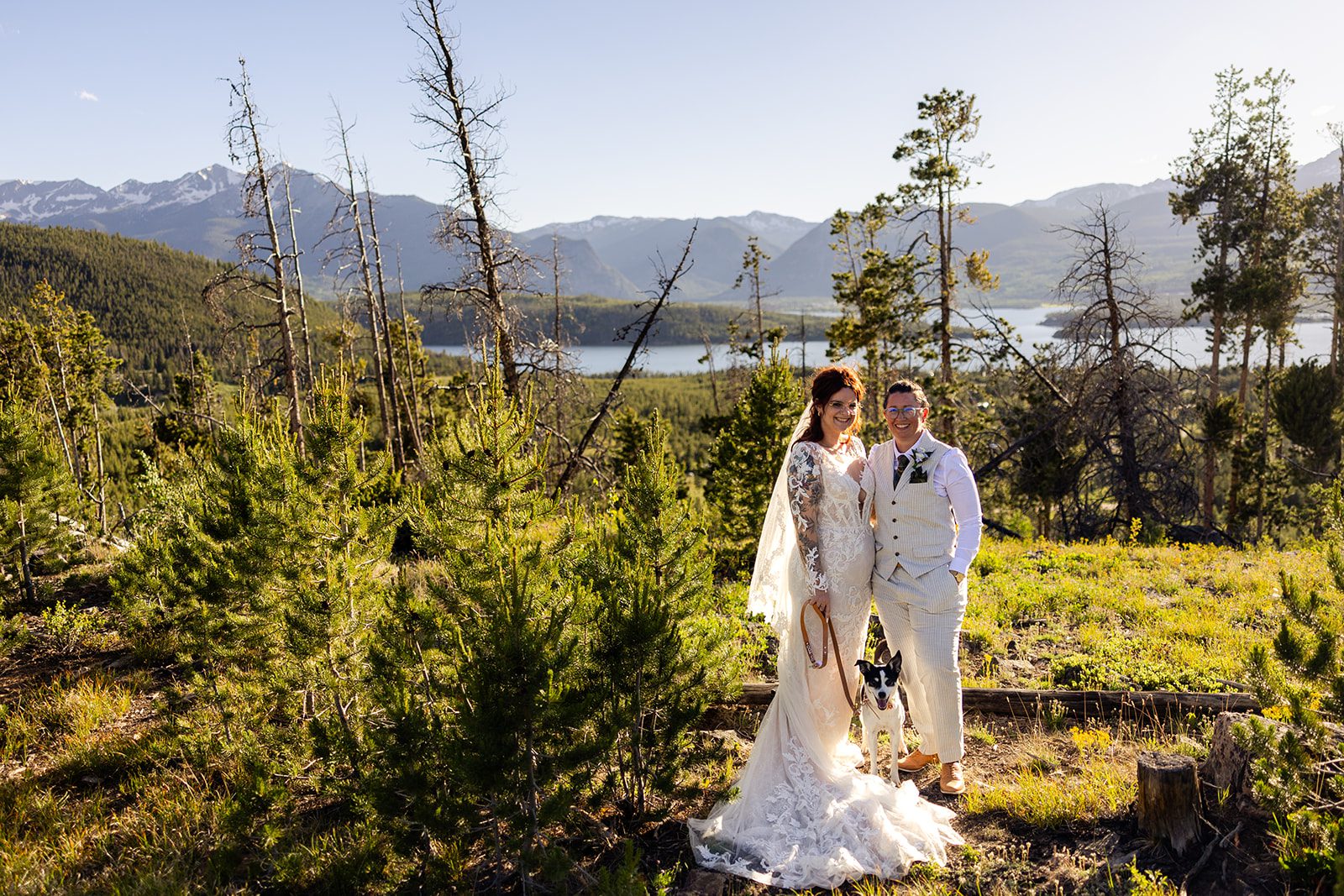 Intimate Summit County Elopement at sunset with two brides and their dog. 