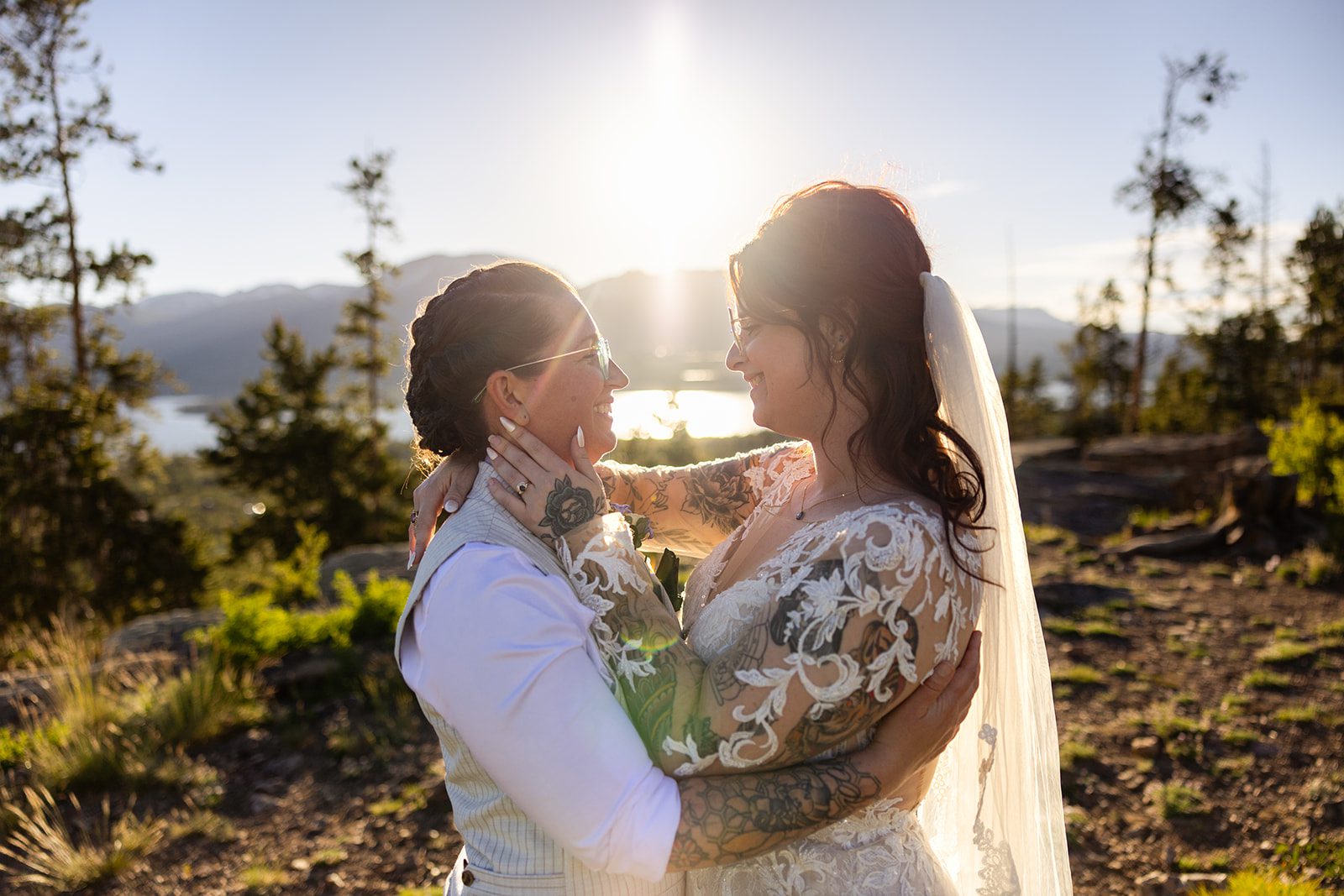 sunset photo of two brides on their Summit County Elopement day. 