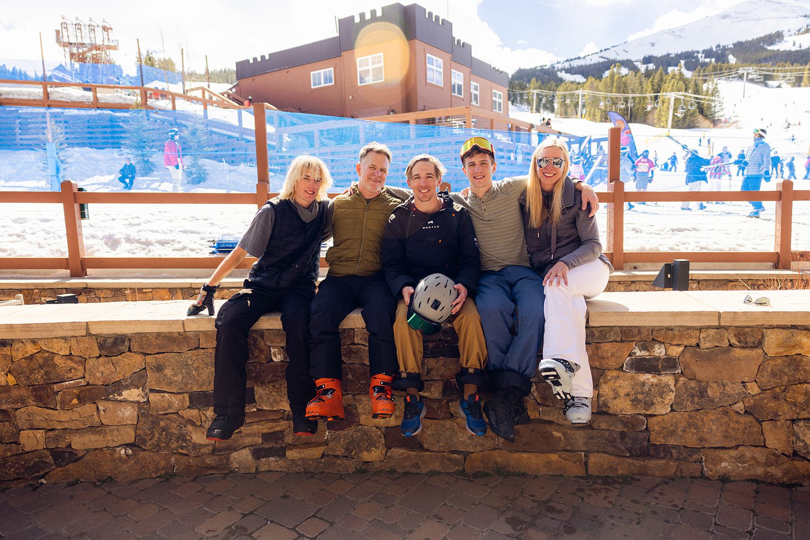 Group family photo at Breckenridge ski resort after parents vow renewal.