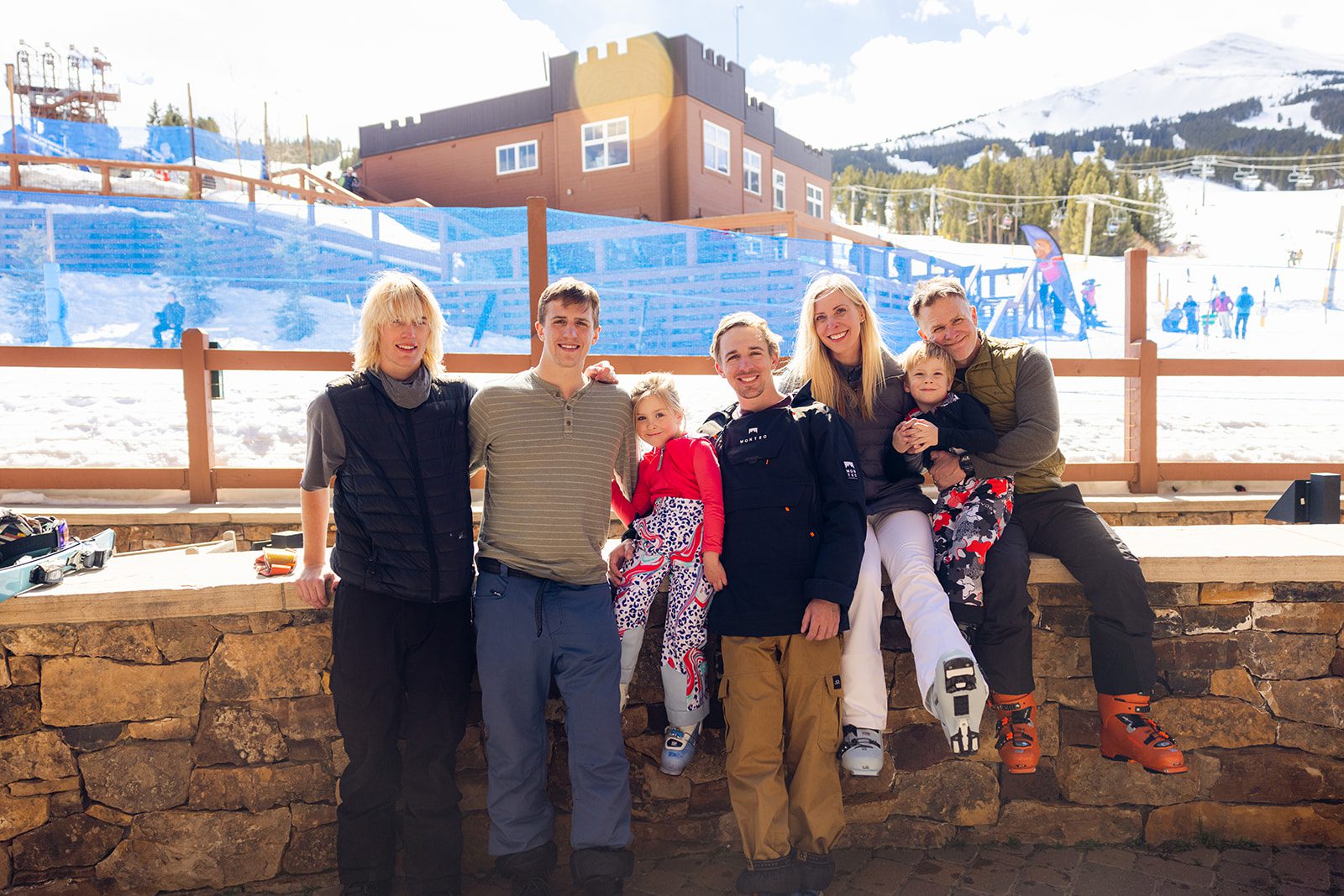 Group family photo at Breckenridge ski resort after parents vow renewal.