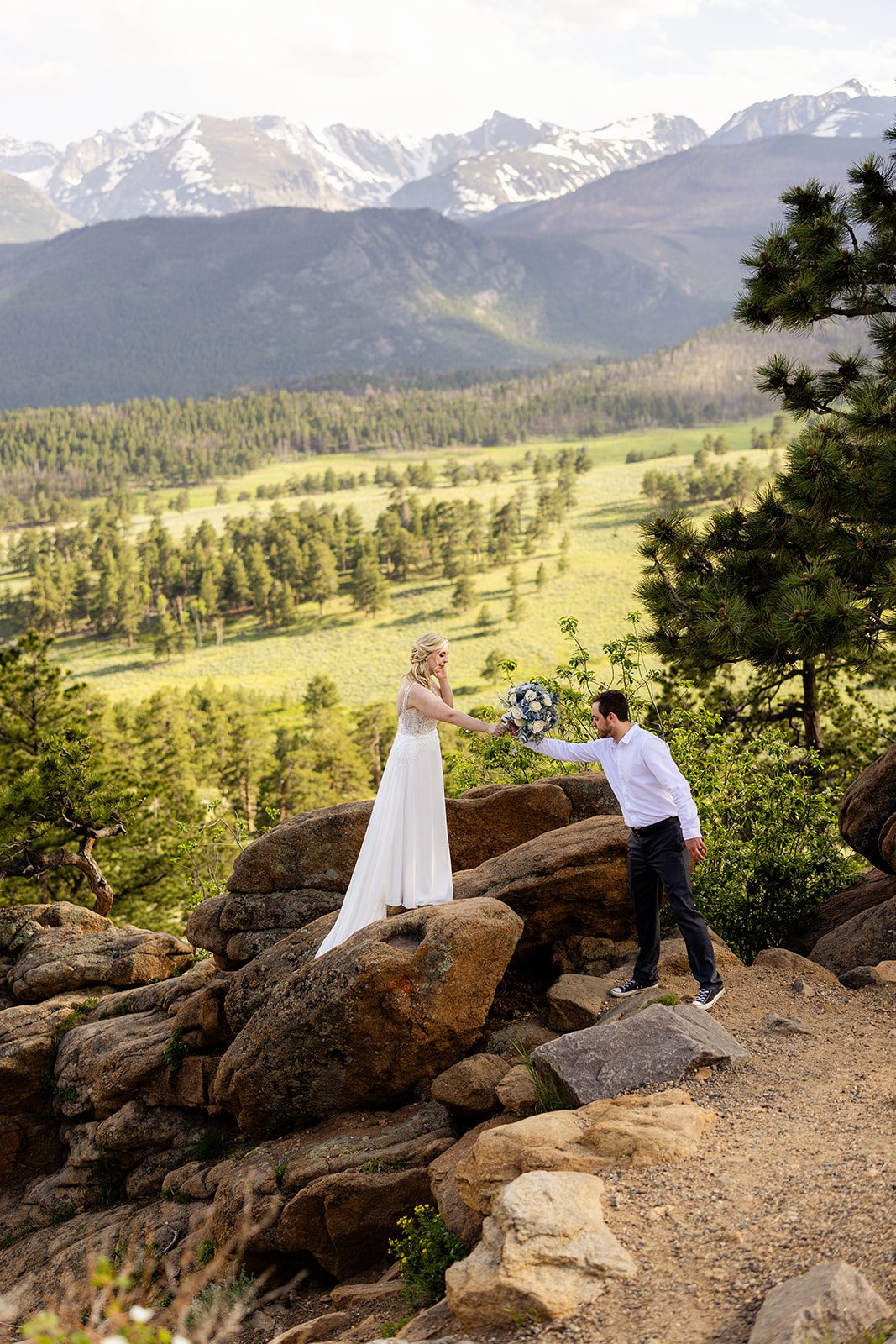 bride and groom adventure elopement in rocky mountain national park.