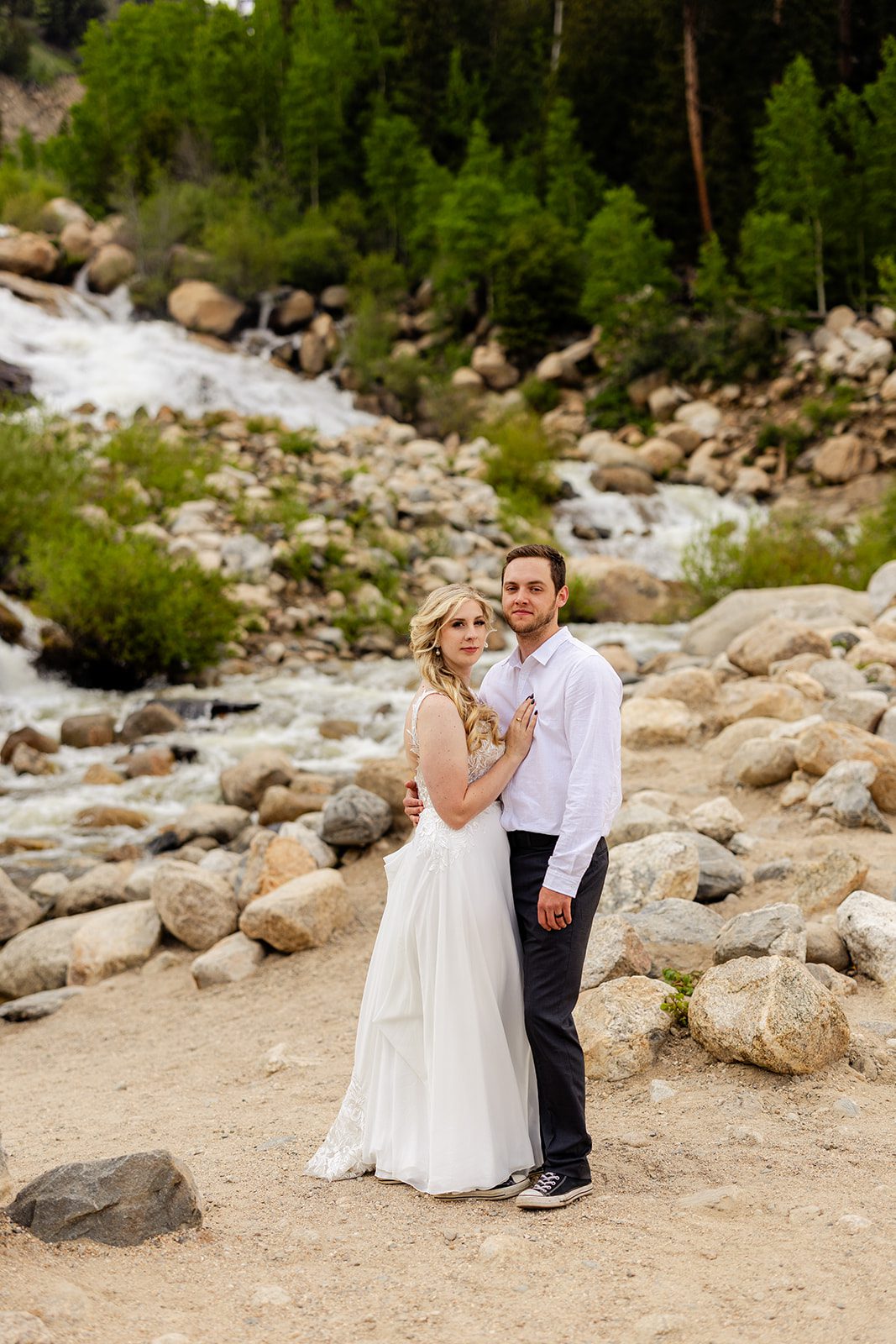 bride and groom a alluvial Fan Bridge & Waterfall for wedding portraits