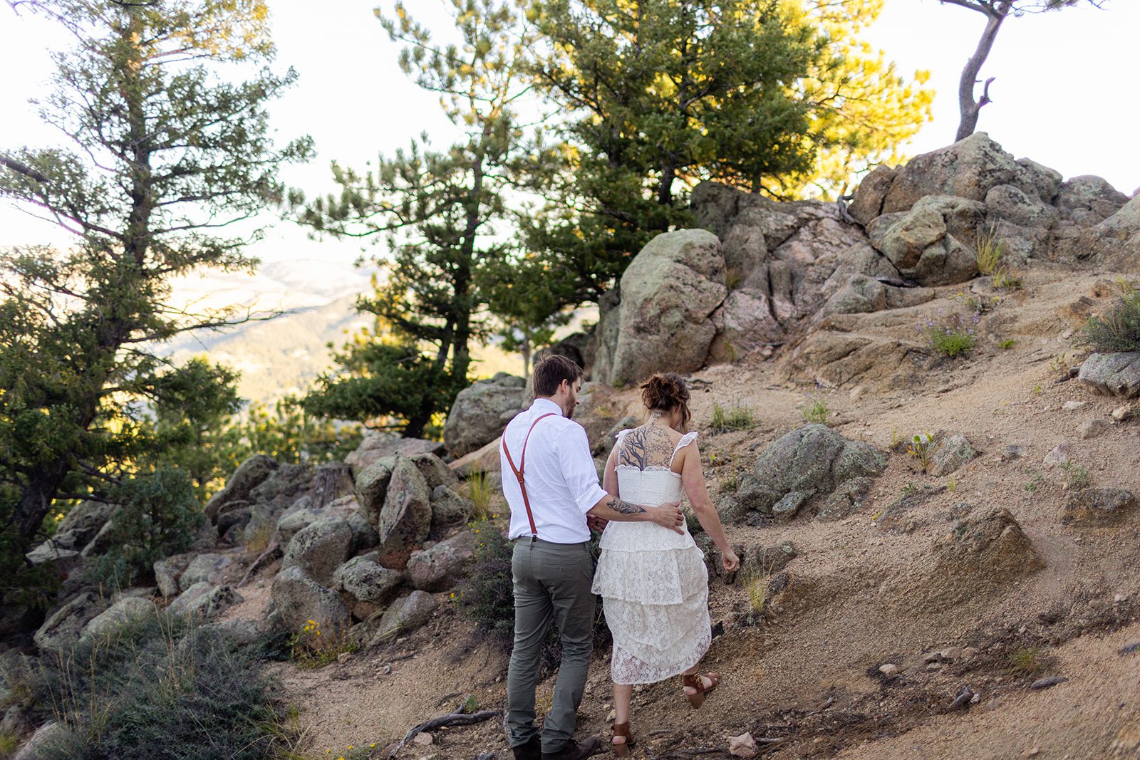 bride and groom on Flagstaff Mountain for sunrise elopement
