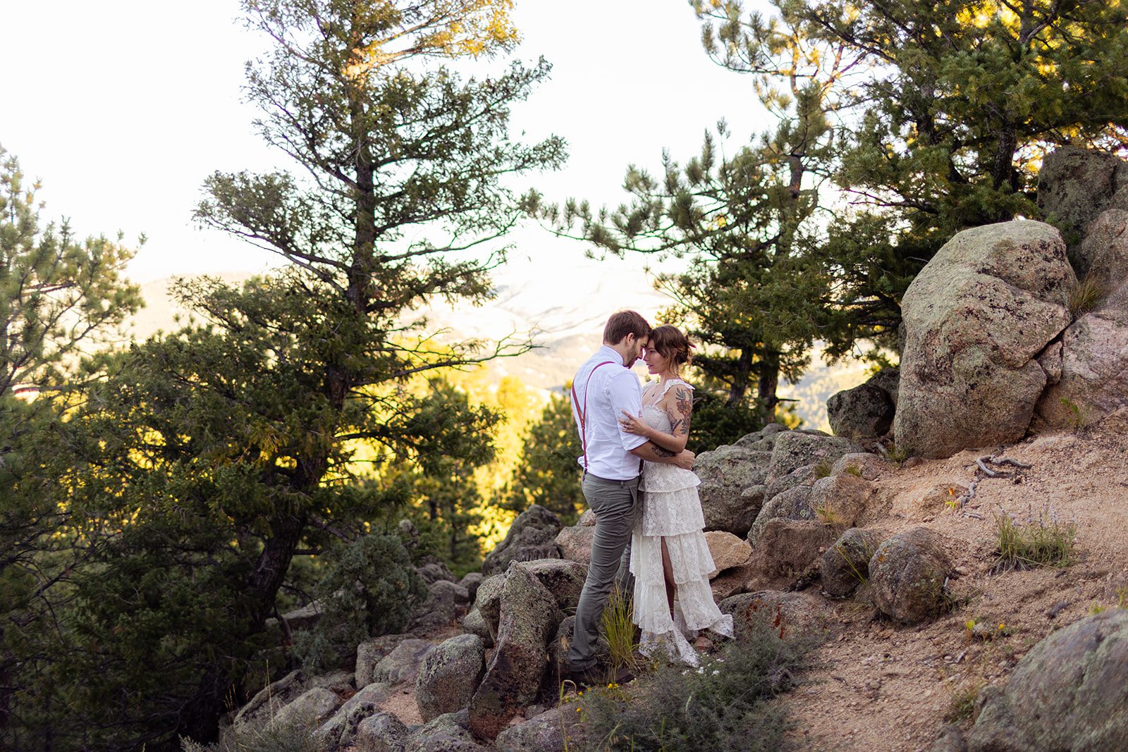 bride and groom forehead to forehead after their sunrise elopement at Artist Point.
