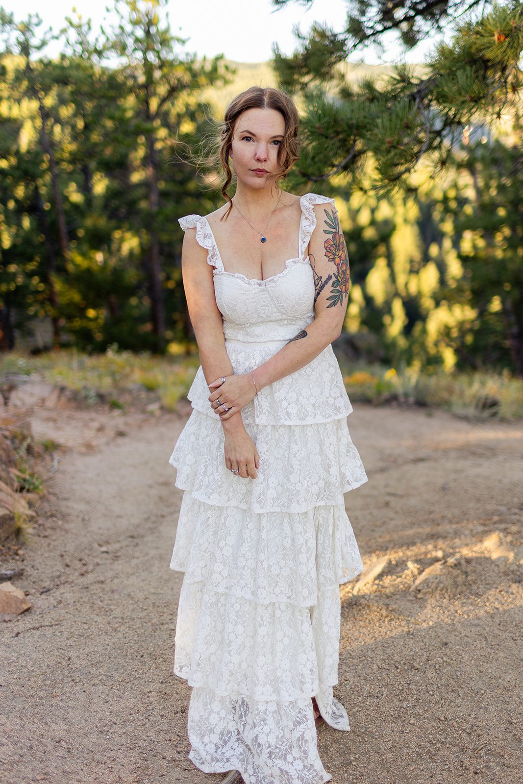 Gorgeous bride in white wedding dress at Artist point in Colorado 