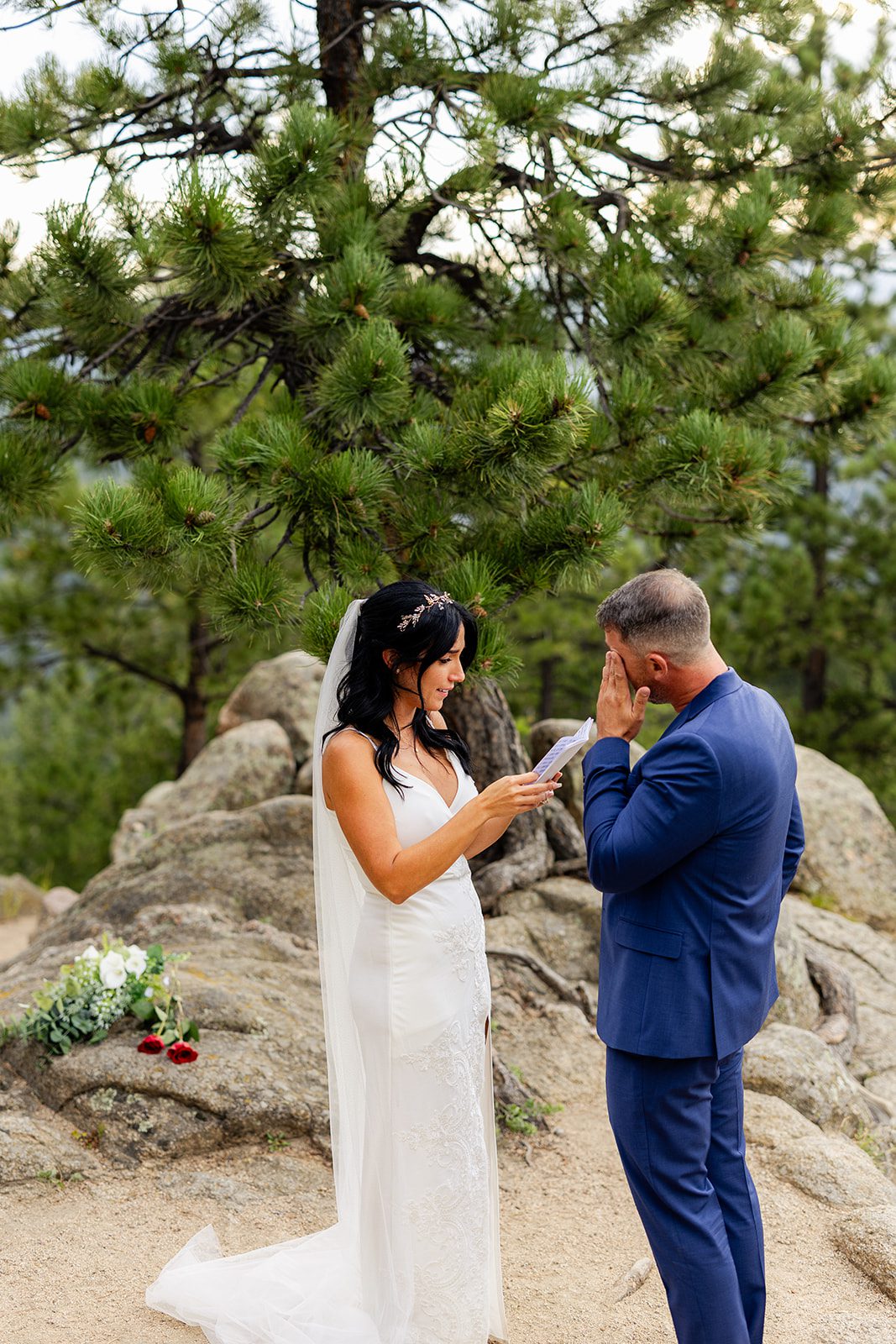 Bride reading vows to groom during Artist Point elopment ceremony. 