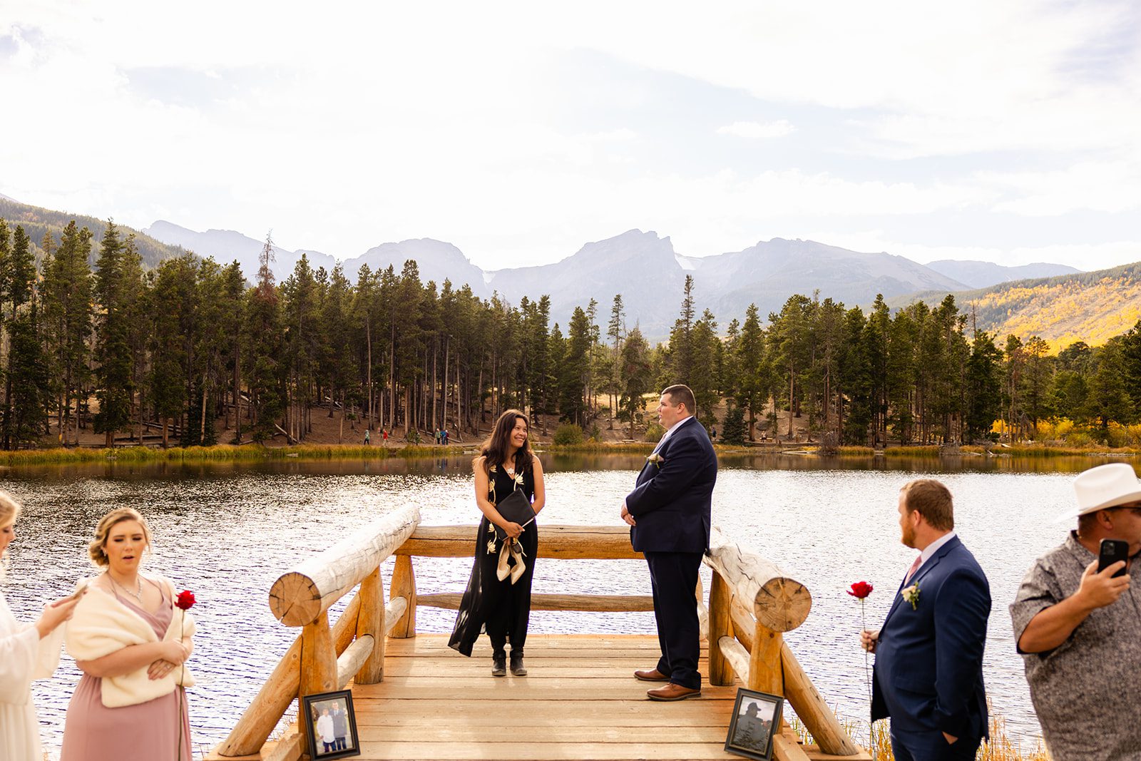 groom waiting patiently for his bride at Sprague lake. 