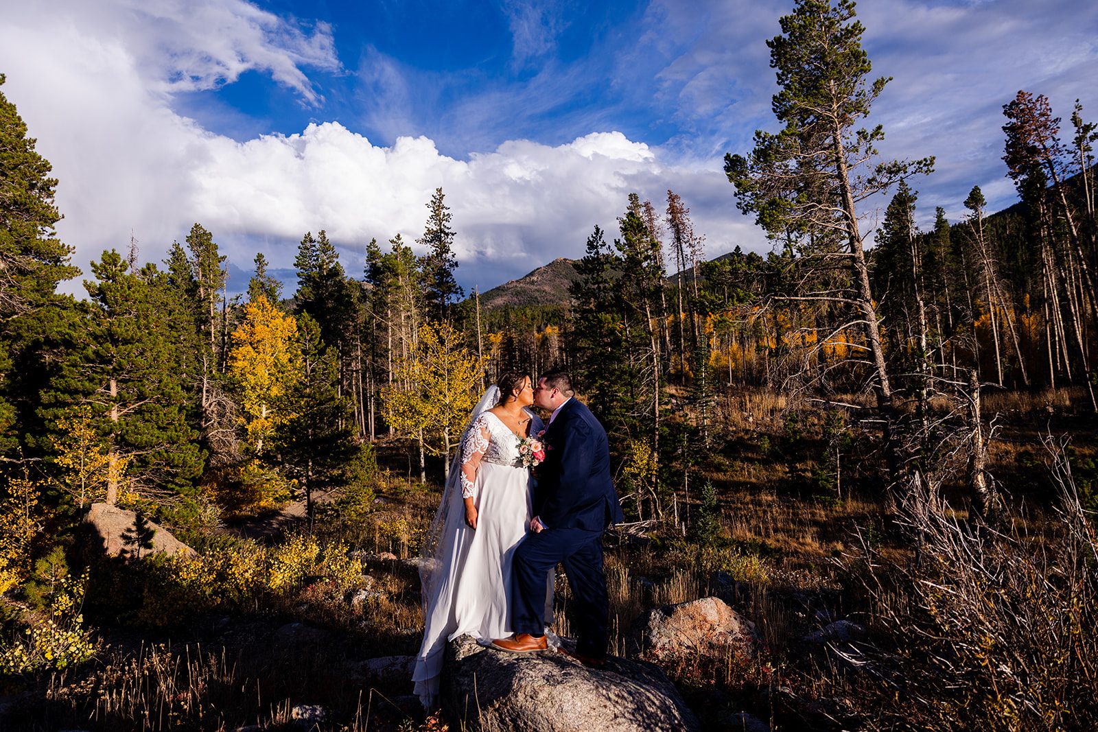 bride and groom on a gorgeous fall day, after their Sprague Lake elopement ceremony in Rocky Mountain National Park. 