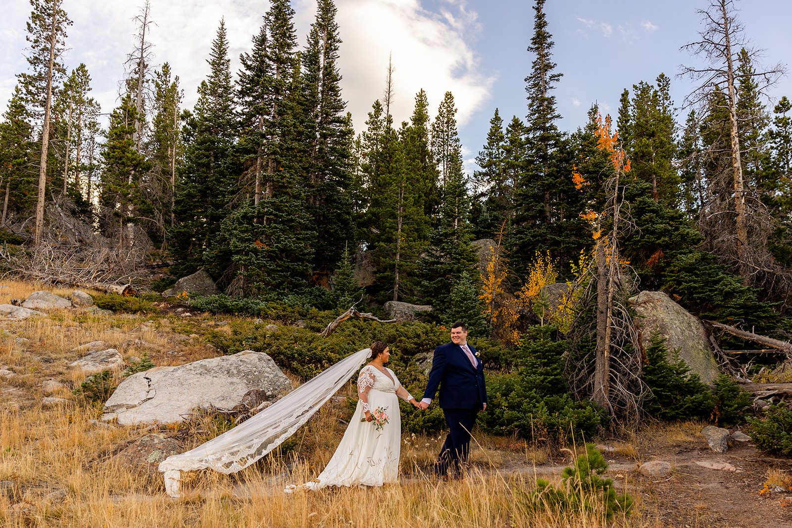 Bride and groom on a gorgeous fall day, for their elopement at Sprague Lake. 